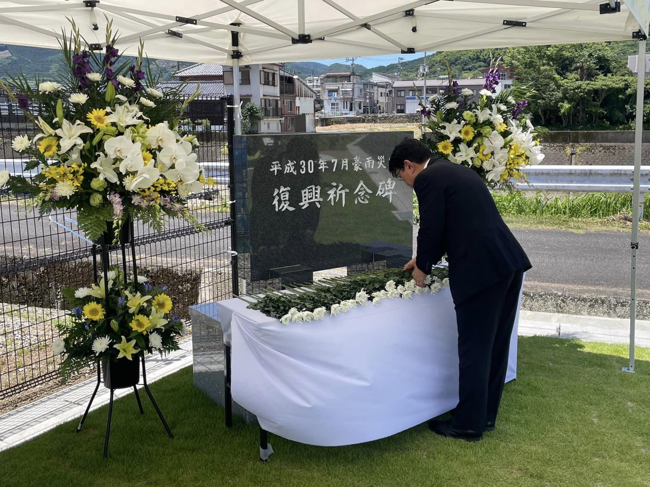 【豪雨災害献花式に出席】